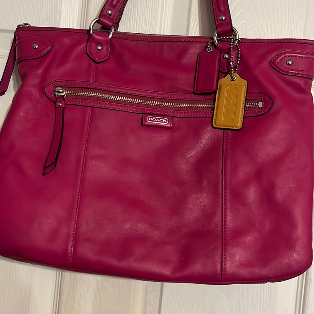 Used Fushia coach bag.